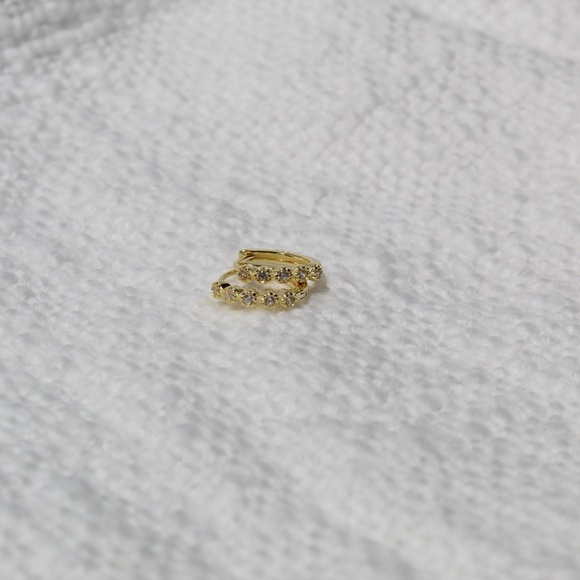 Sterling Silver Gold Huggie Hoops with Row of Isolated Simulated Diamonds - Picture 5 of 12